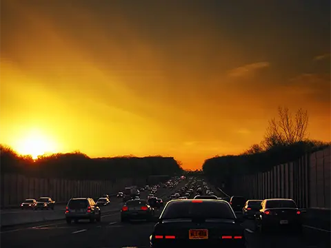 driving at rush hour at dusk - ASLEEP AT THE WHEEL<br>by Karl Sherlock