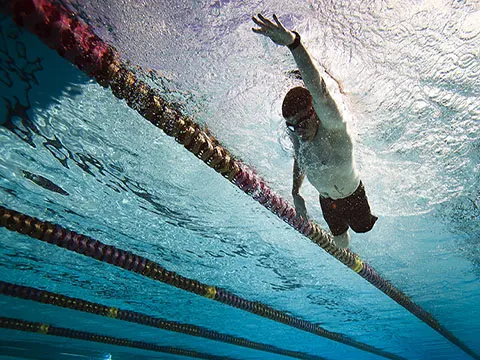 A Wounded Warrior swims laps during practice for the 2012 Marine Corps Trials at Marine Corps Base Camp Pendleton, CA, Feb 15, 2012 - most everyone we know is swimming by Mela Blust
