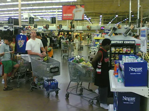 Waiting lines in a Walmart - In a Span of Minutes by Micki Blenkush