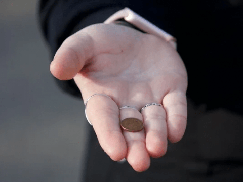 A coin in a hand